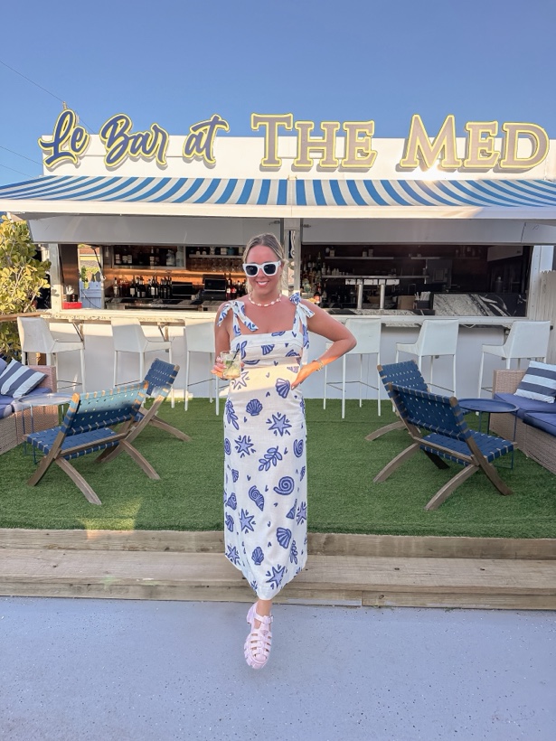 Ashleigh Malangone at a restaurant terrace
